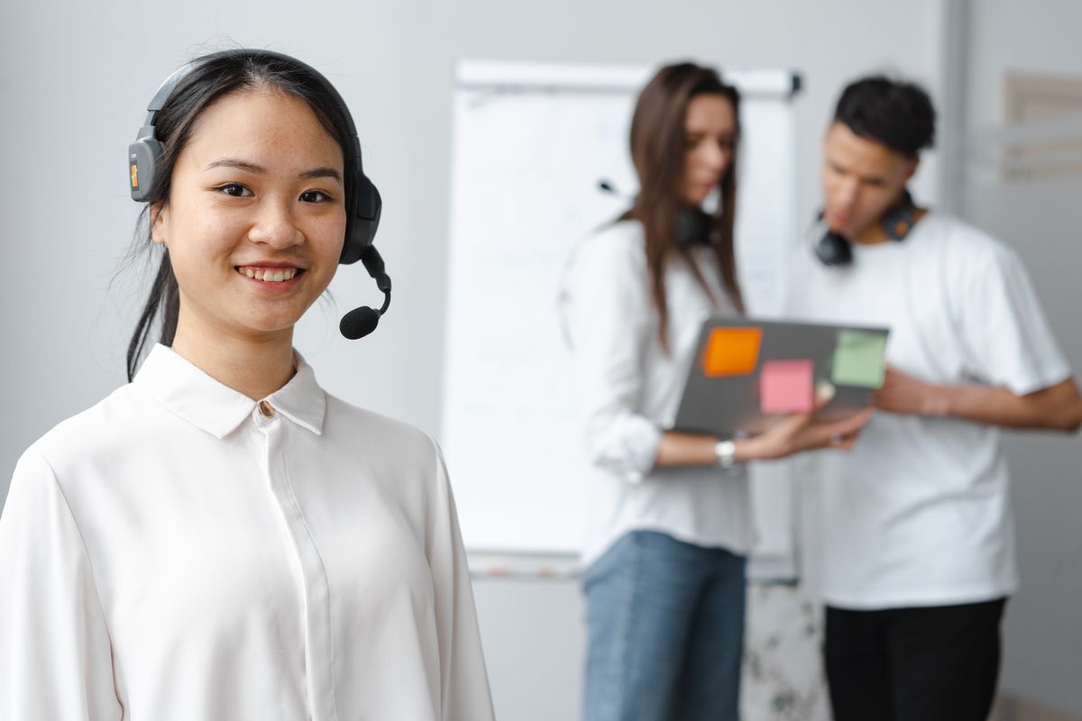 Customer smiling while messaging support on her phone
